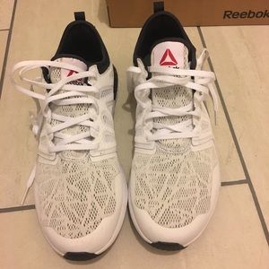 Brand new white Reebok sneakers